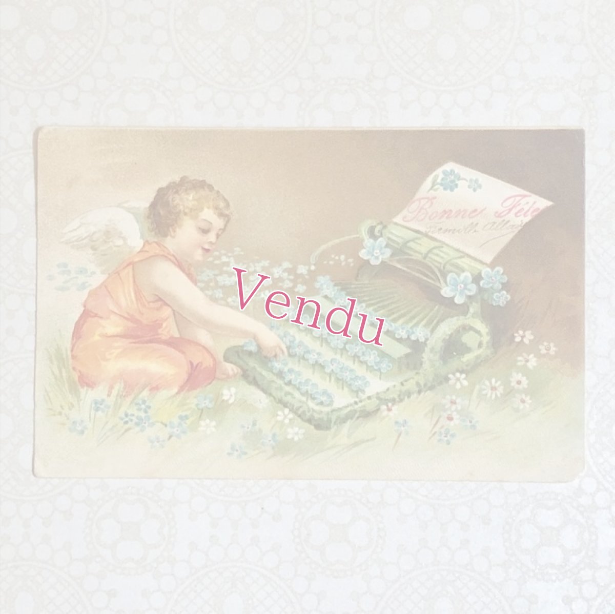 画像1: お花のタイプを打つ天使柄のポストカード (1)