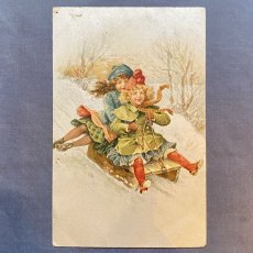 画像1: ソリに乗る少女のポストカード (1)